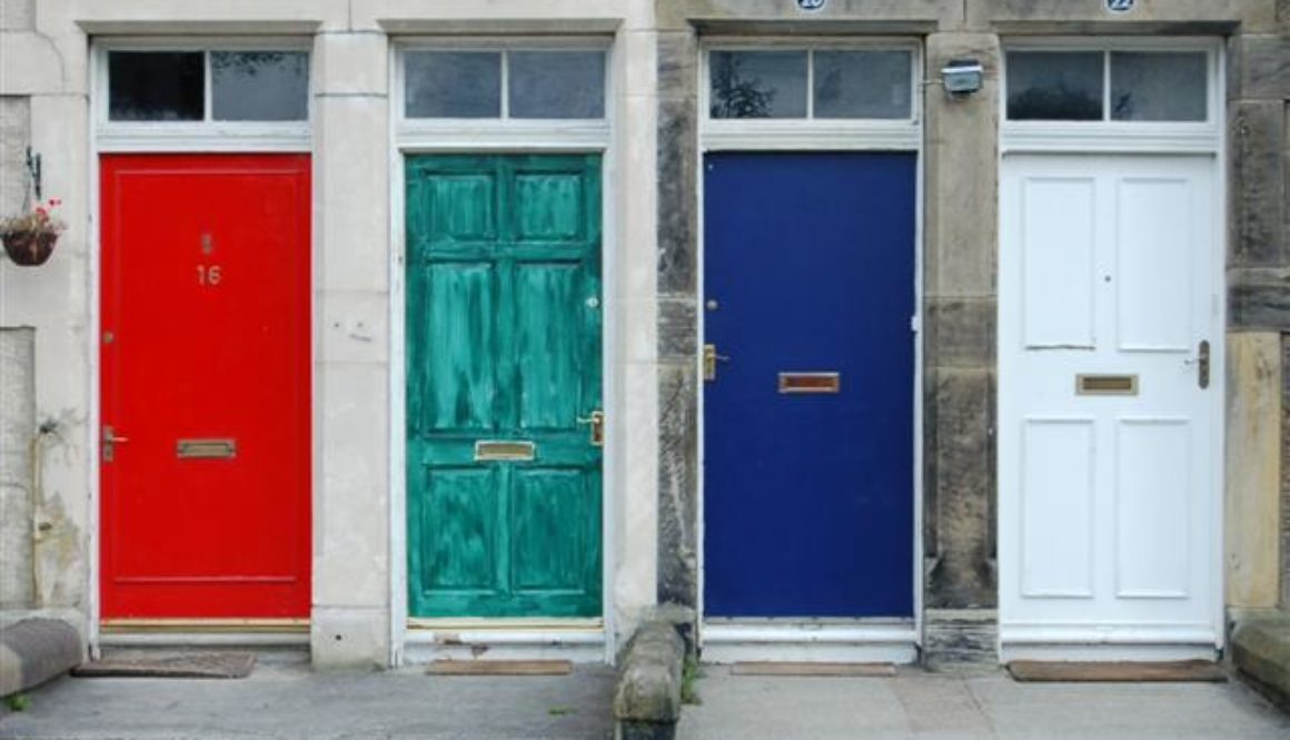 four differently colored front doors